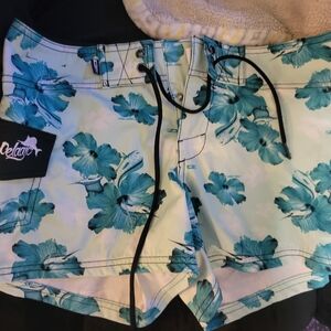 Pelagic Women's Athletic Shorts - Teal Floral